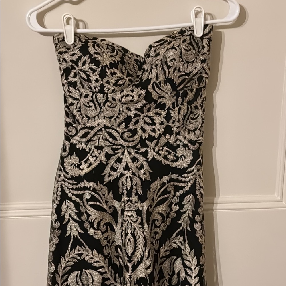 Black and Gold strapless formal gown. Great for formal event, prom, etc..